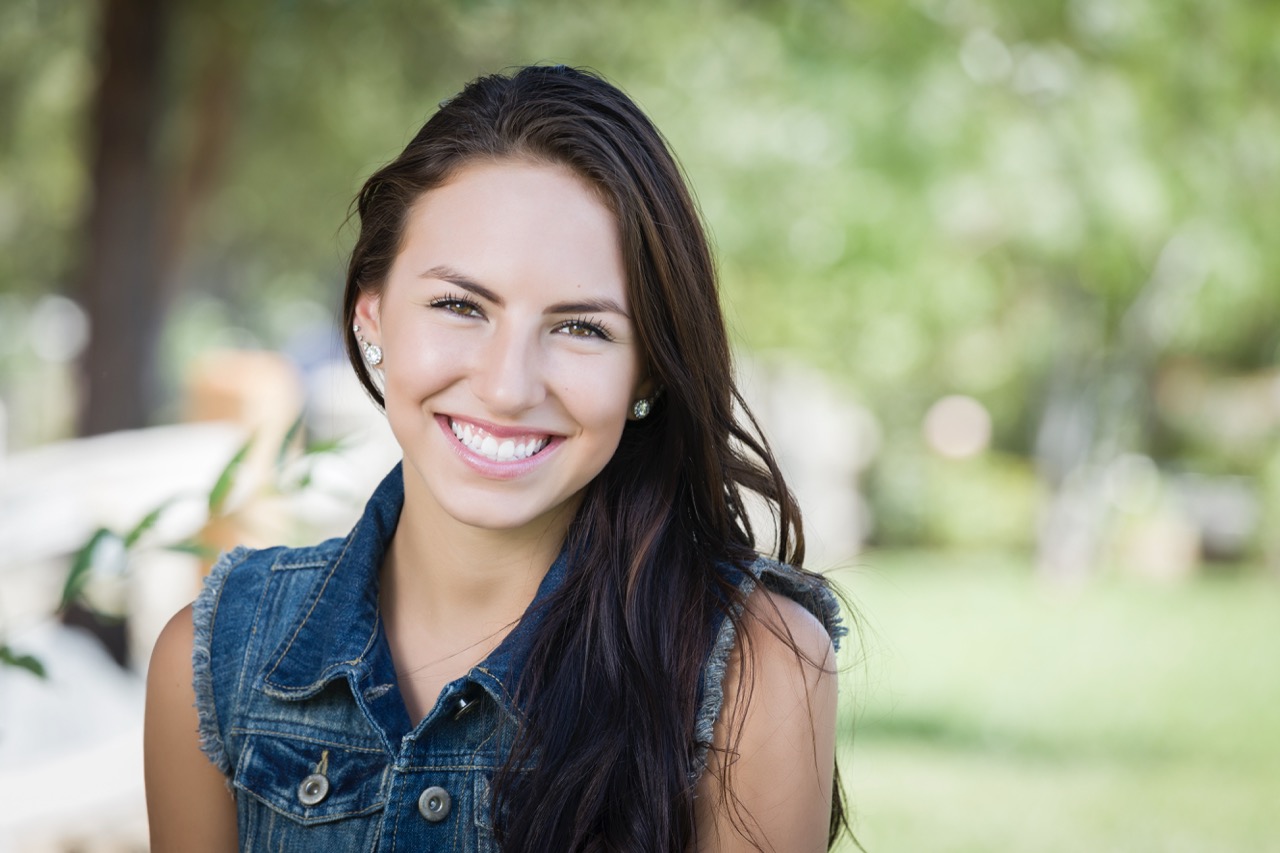 Attractive Mixed Race Girl Portrait Outdoors.